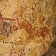 Graffiti dalle grotte di Altamira: impronta di mano e cavallo rosso